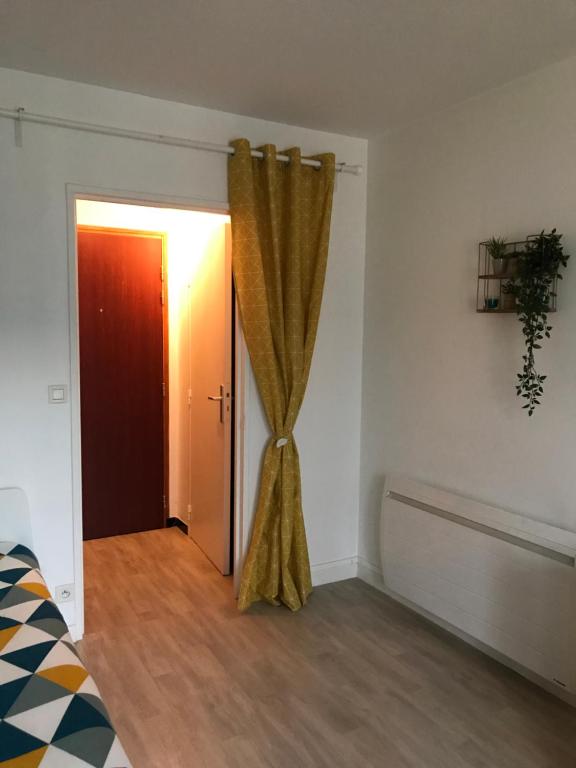 Postel nebo postele na pokoji v ubytování Le Villeneuve