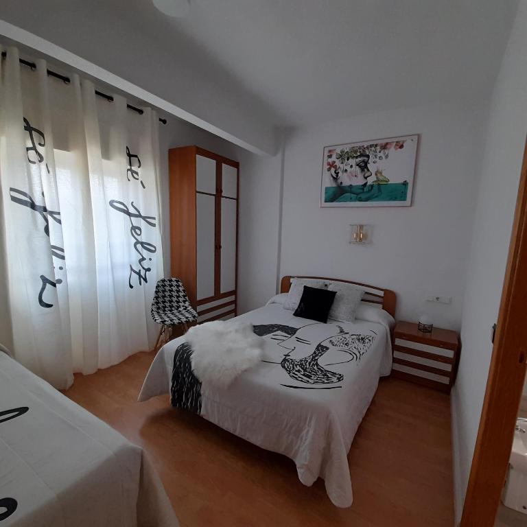 Postel nebo postele na pokoji v ubytování Hostal "Los Chanos el Ruso"