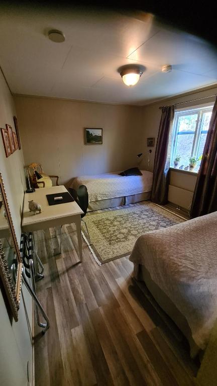 Posezení v ubytování Skogsbrynet B&B, Bredsjö Nya Herrgård