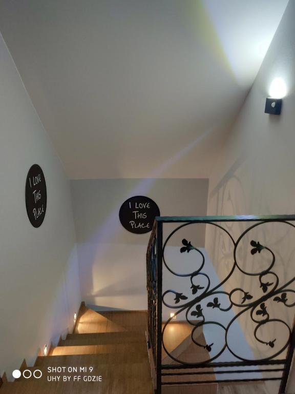Posteľ alebo postele v izbe v ubytovaní Apartamenty Pod Sosnami Ostróda Międzylesie 6os