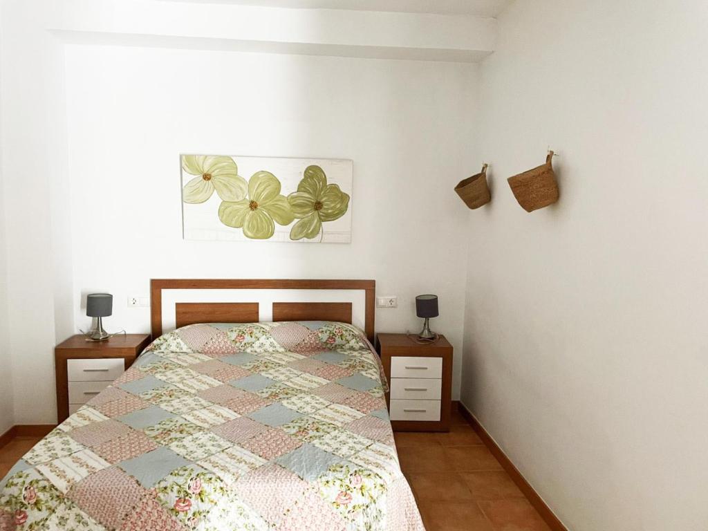 A bed or beds in a room at Apartamentos Villaaltea - Bella