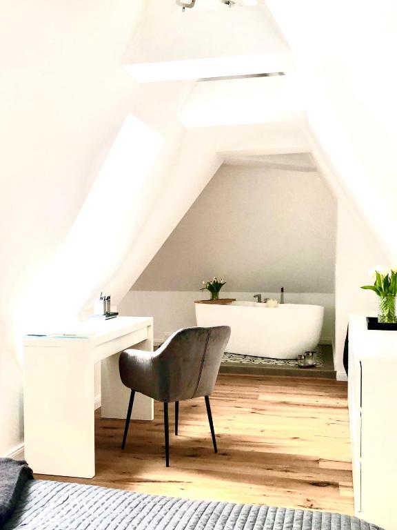 Posezení v ubytování Das Stader Loft mit Sonnenbalkon
