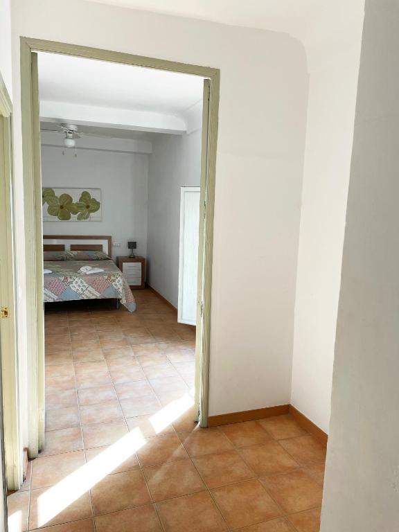 A bed or beds in a room at Apartamentos Villaaltea - Bella