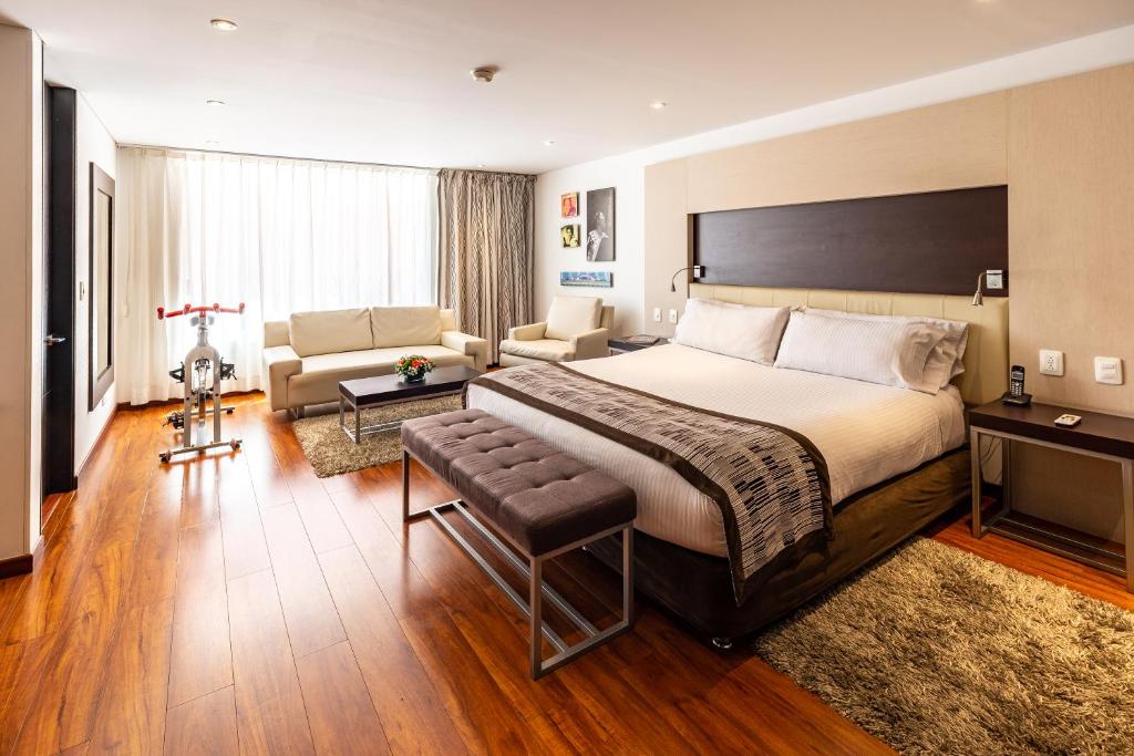 Postel nebo postele na pokoji v ubytování Hotel Jazz Apartments