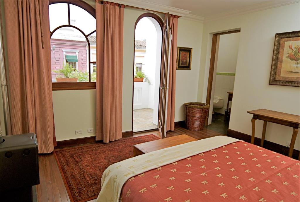 Postel nebo postele na pokoji v ubytování Boutique Hotel Casa Foch