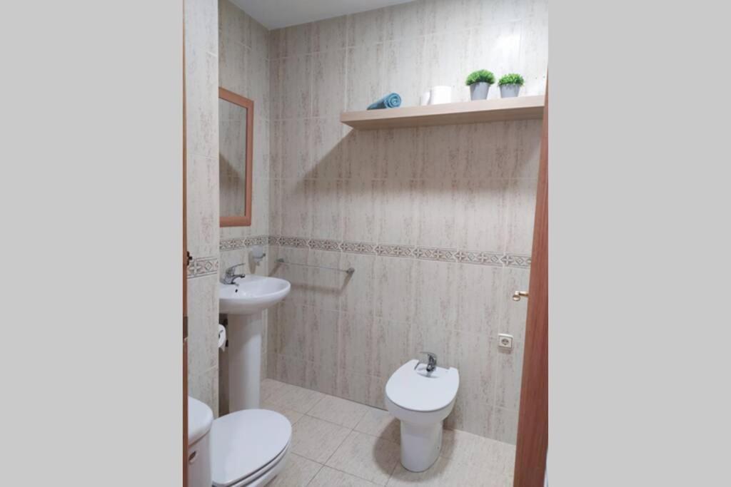 Kúpeľňa v ubytovaní Amplio y céntrico apartamento junto al mar