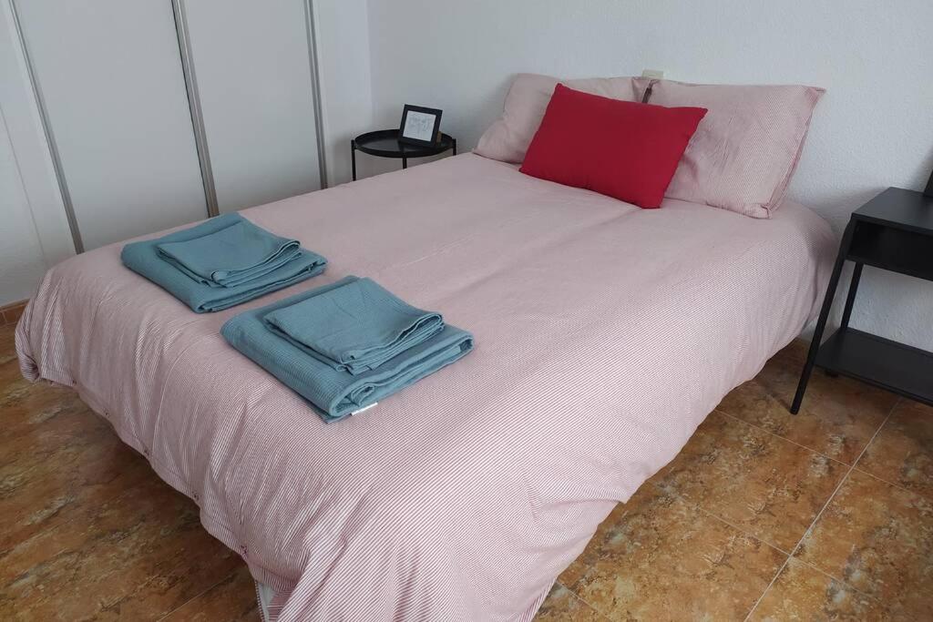 Posteľ alebo postele v izbe v ubytovaní Amplio y céntrico apartamento junto al mar