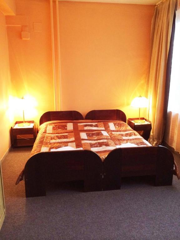 Postel nebo postele na pokoji v ubytování Hotel Uno