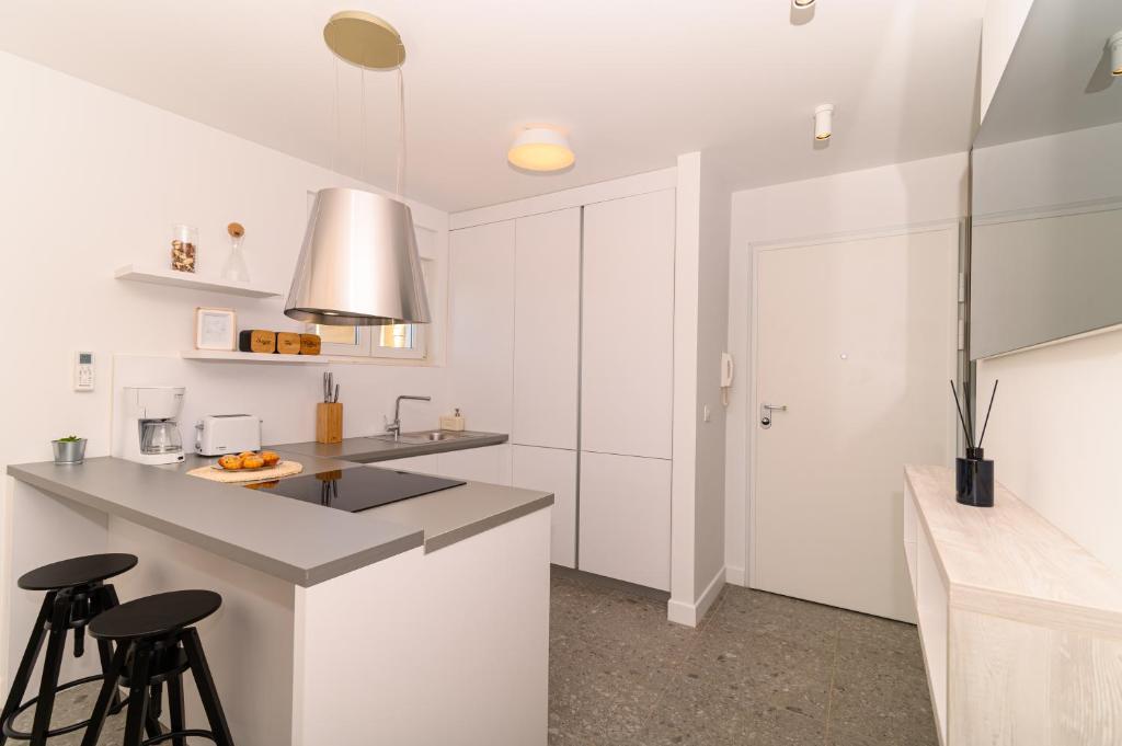 Kuchyňa alebo kuchynka v ubytovaní Hygge Boutique Apartment