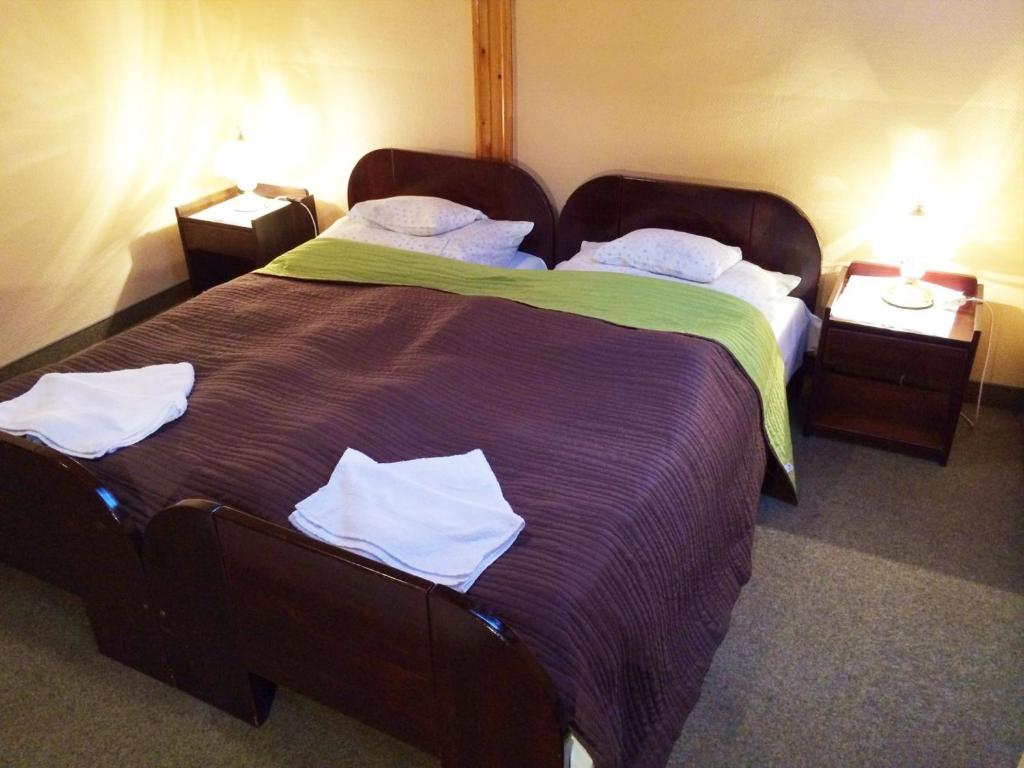 Postel nebo postele na pokoji v ubytování Hotel Uno