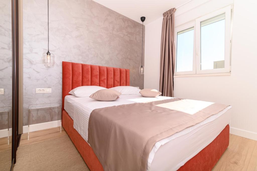 Posteľ alebo postele v izbe v ubytovaní Hygge Boutique Apartment