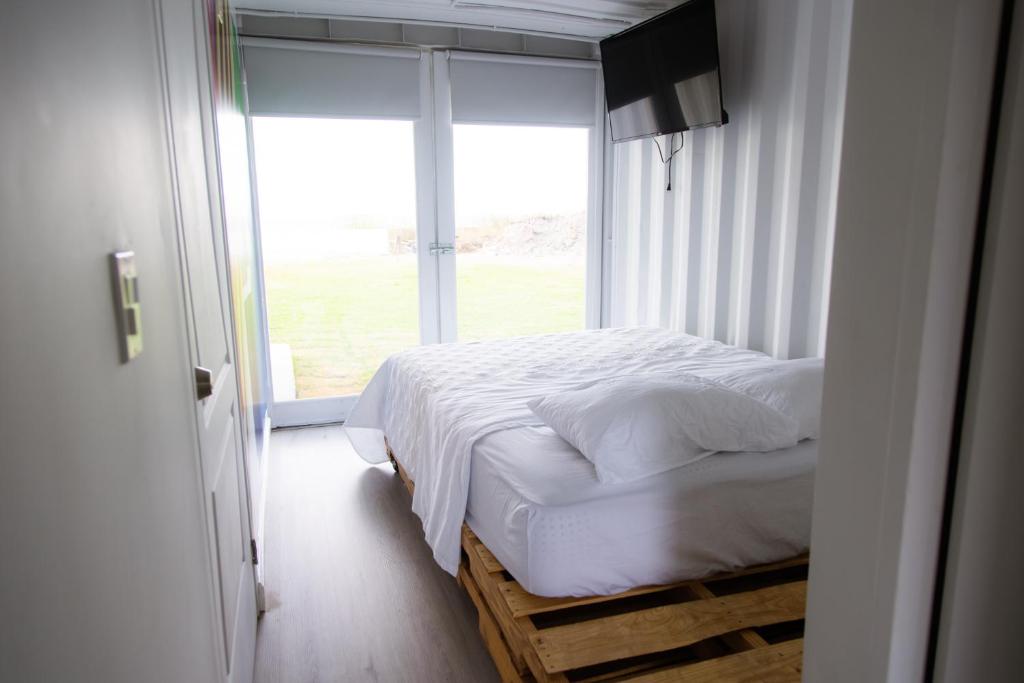 Postel nebo postele na pokoji v ubytování Nomada Republic Hotel Punta Chame