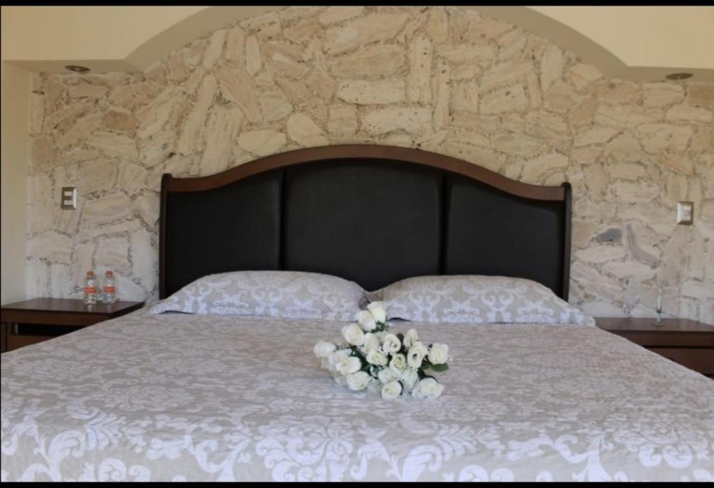 Postel nebo postele na pokoji v ubytování Hotel San Diego