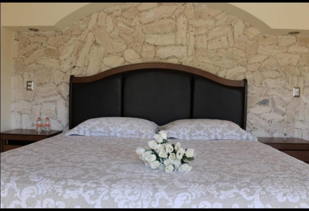 Postel nebo postele na pokoji v ubytování Hotel San Diego