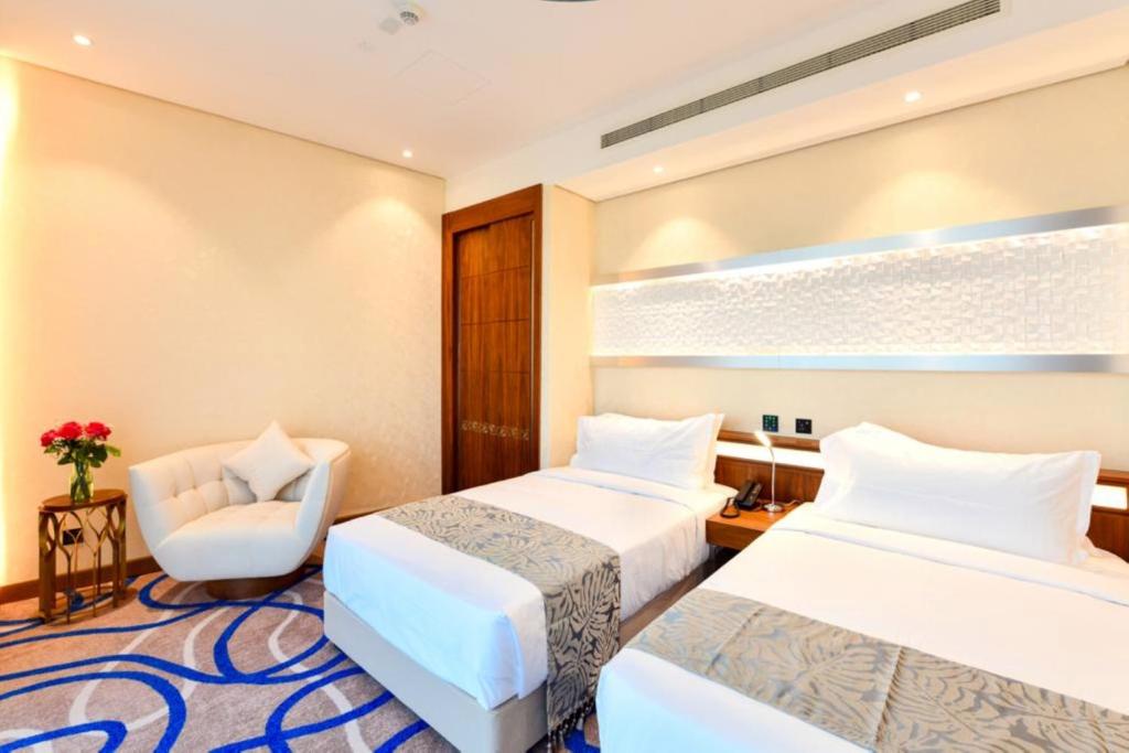 Katil atau katil-katil dalam bilik di Cielo Hotel Lusail Qatar
