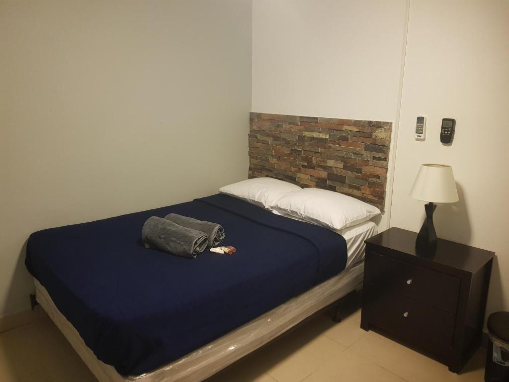 Postel nebo postele na pokoji v ubytování Always Summer Inn
