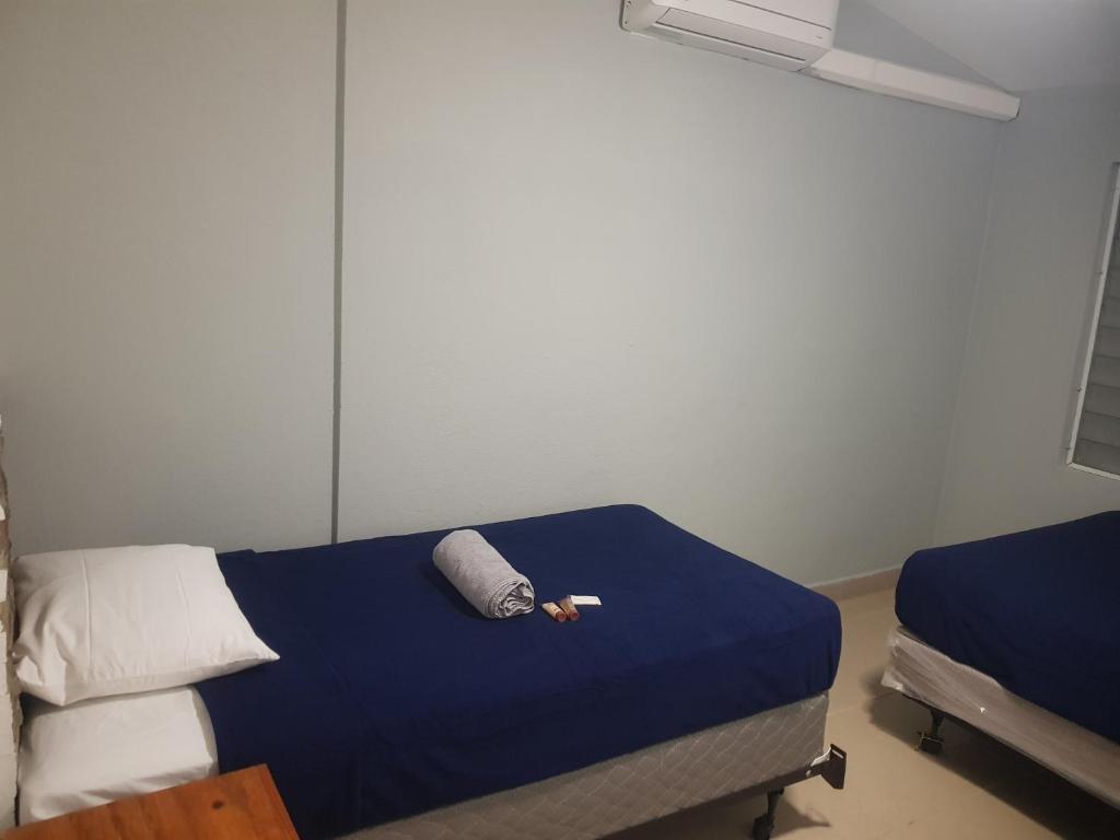 Postel nebo postele na pokoji v ubytování Always Summer Inn