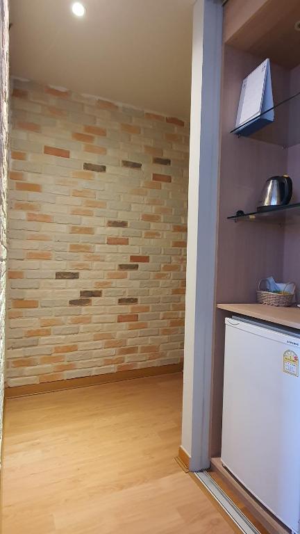 Kuchyň nebo kuchyňský kout v ubytování Gyungpo Beach Hotel