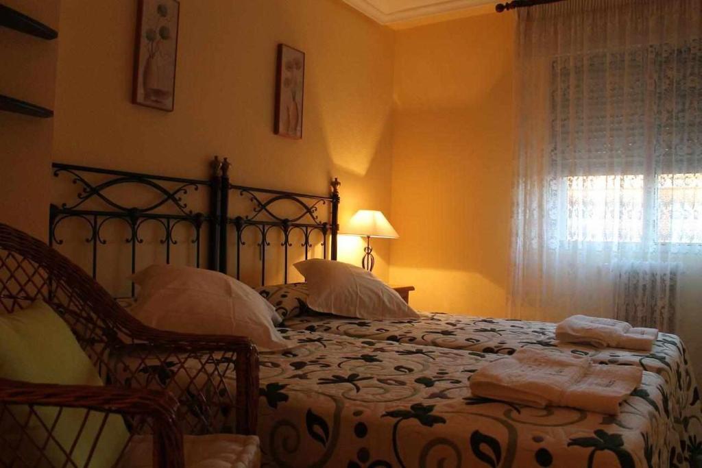 Posteľ alebo postele v izbe v ubytovaní Alojamiento La Olmedana