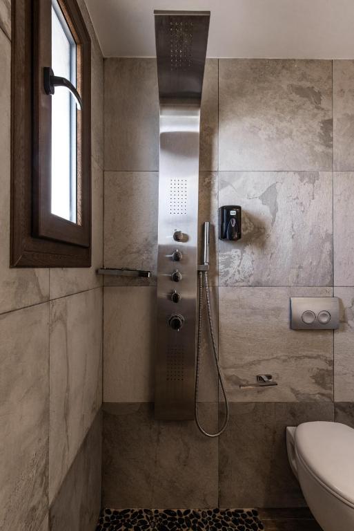 Um banheiro em GARDELLI RESORT
