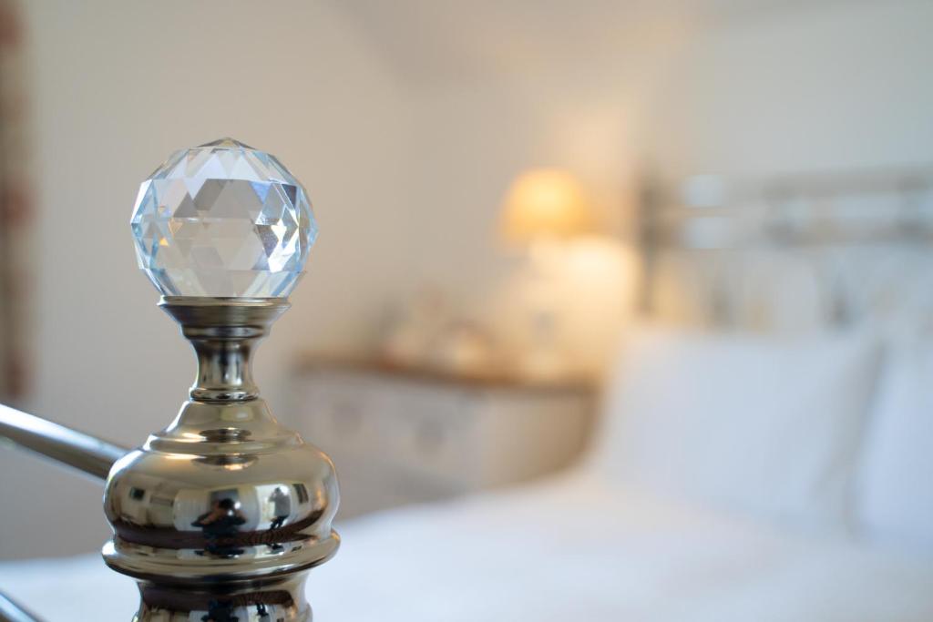 A bed or beds in a room at Rest a While