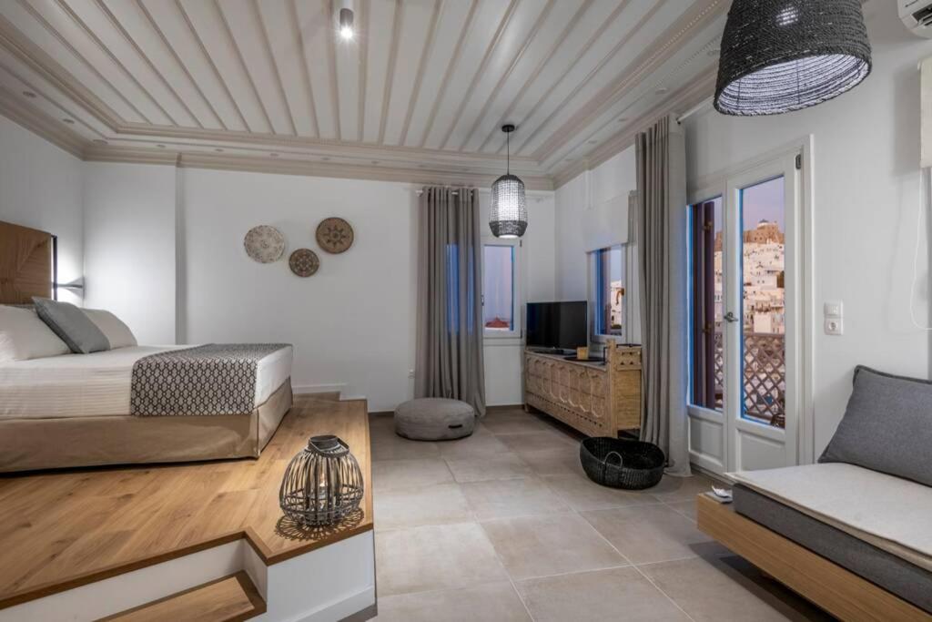 TV a/nebo společenská místnost v ubytování Luxury Apartment in the Heart of Astypalaia
