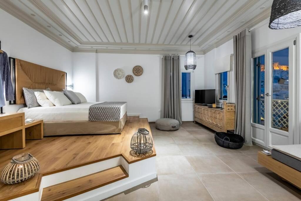 Postel nebo postele na pokoji v ubytování Luxury Apartment in the Heart of Astypalaia