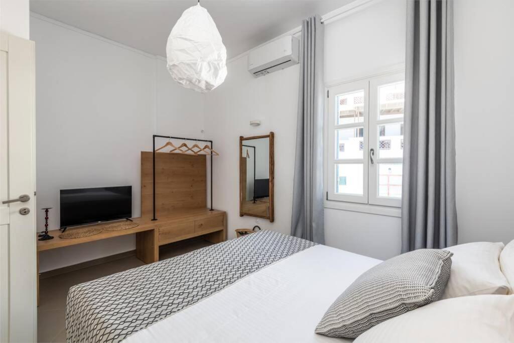 Postel nebo postele na pokoji v ubytování Luxury Apartment in the Heart of Astypalaia