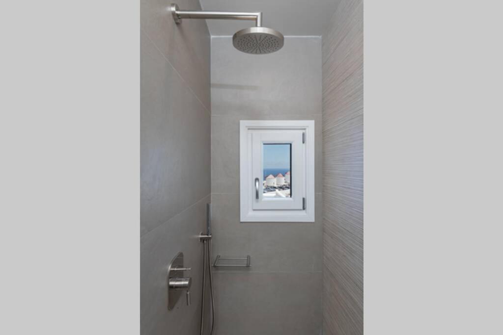 Koupelna v ubytování Luxury Apartment in the Heart of Astypalaia