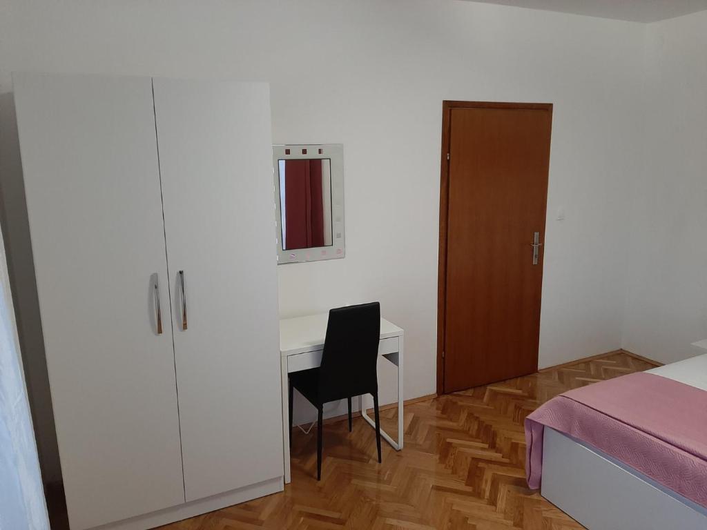 Posteľ alebo postele v izbe v ubytovaní Apartments Roby 3M