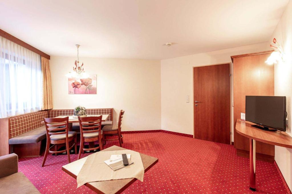 A television and/or entertainment centre at Panorama Appartements