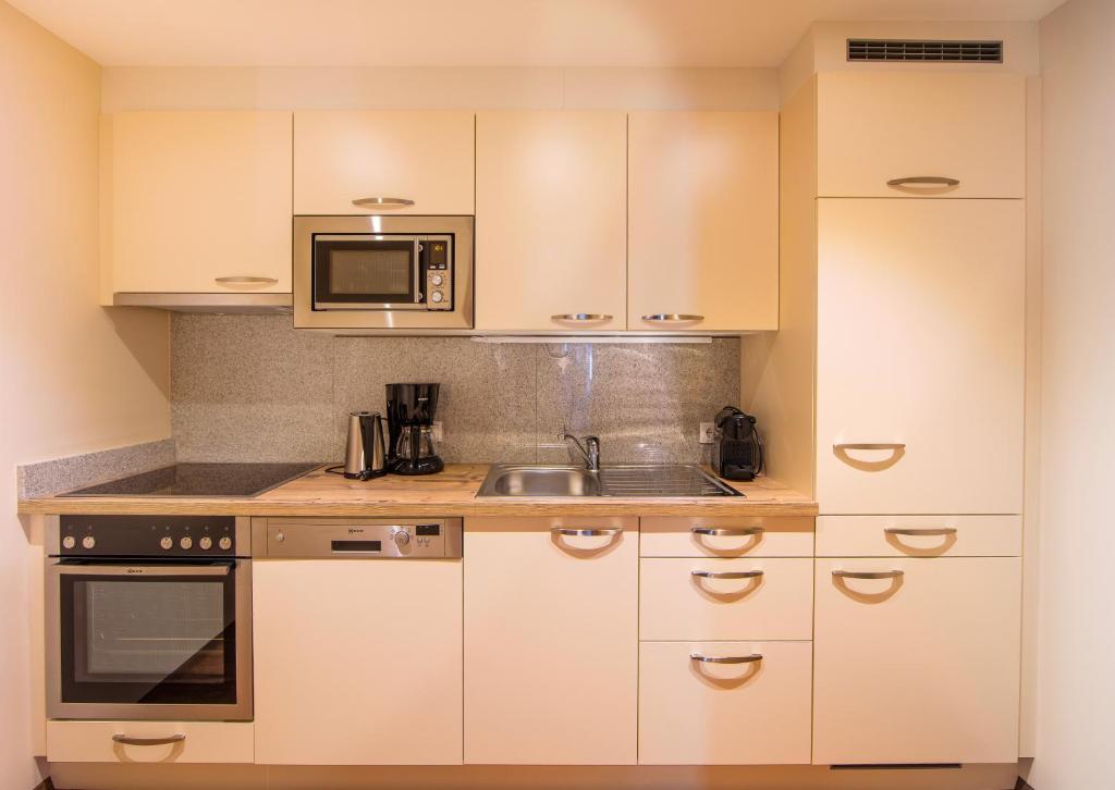 A kitchen or kitchenette at Panorama Appartements