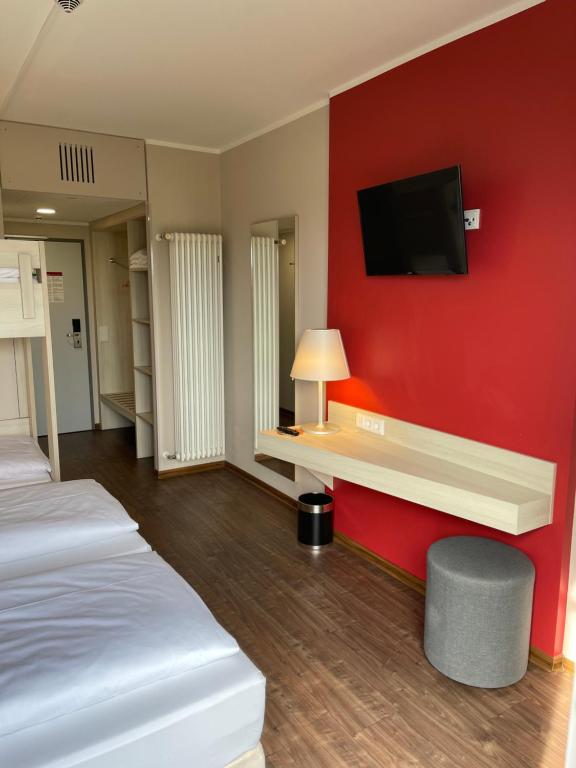 TV a/nebo společenská místnost v ubytování Hotel Irschenberg Süd
