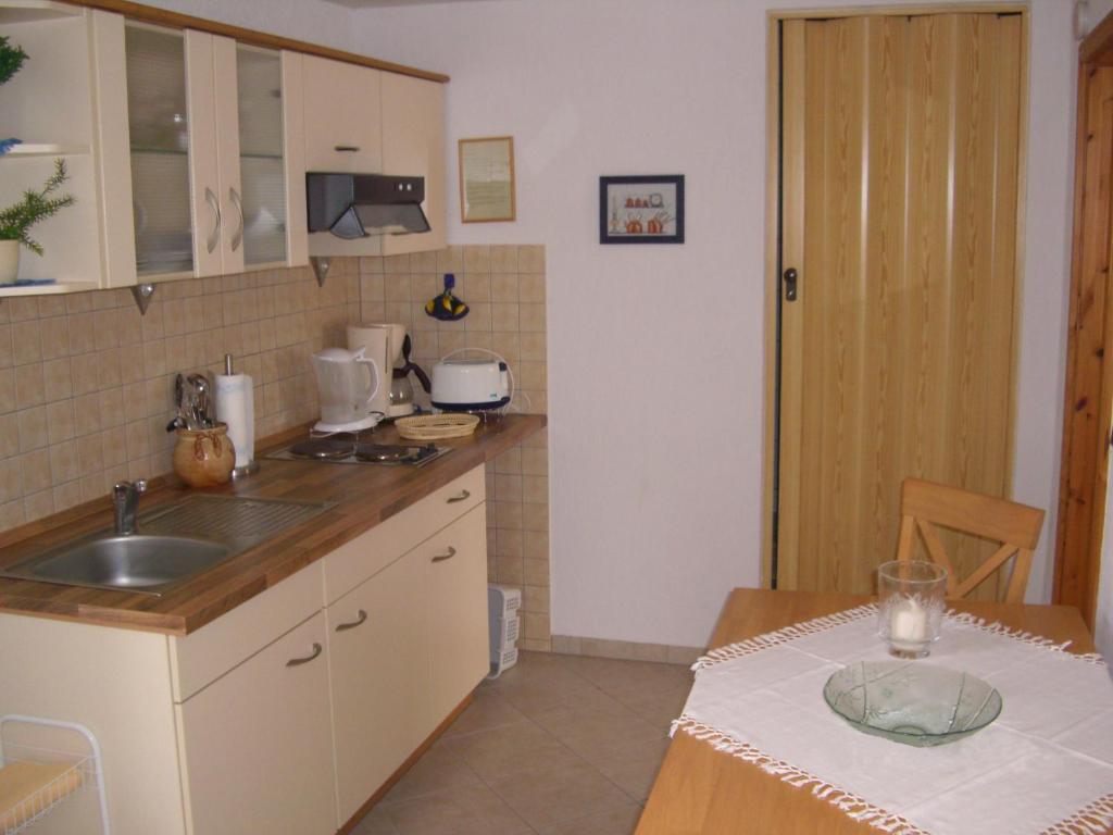Kuchyň nebo kuchyňský kout v ubytování Gästehaus Jeremias