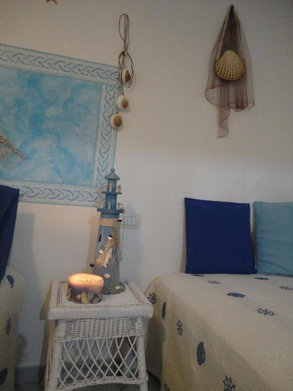 A bed or beds in a room at B&B Mare E Natura