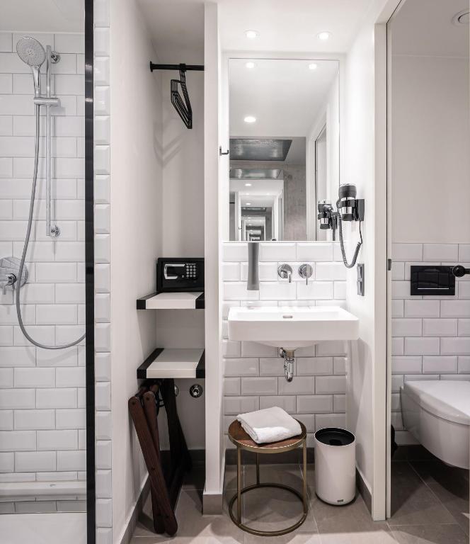 Koupelna v ubytování gambino hotel WERKSVIERTEL