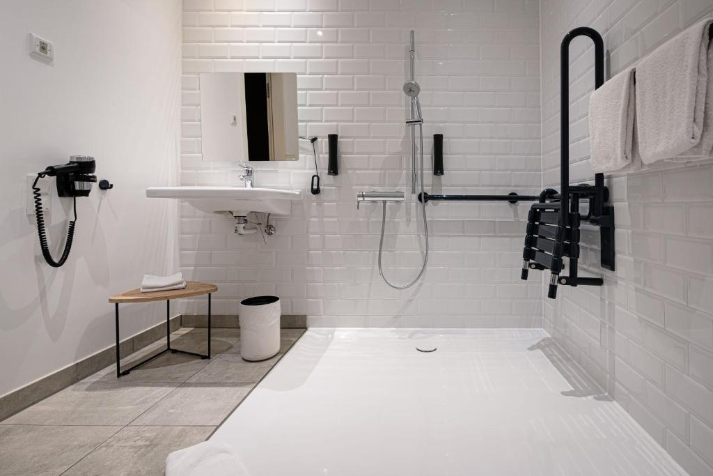 Koupelna v ubytování gambino hotel WERKSVIERTEL