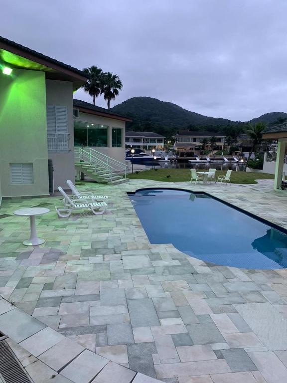  Casa na praia em condomínio de luxo