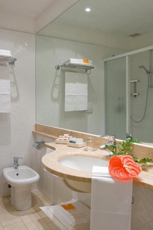 Koupelna v ubytování Hotel Club Lacona