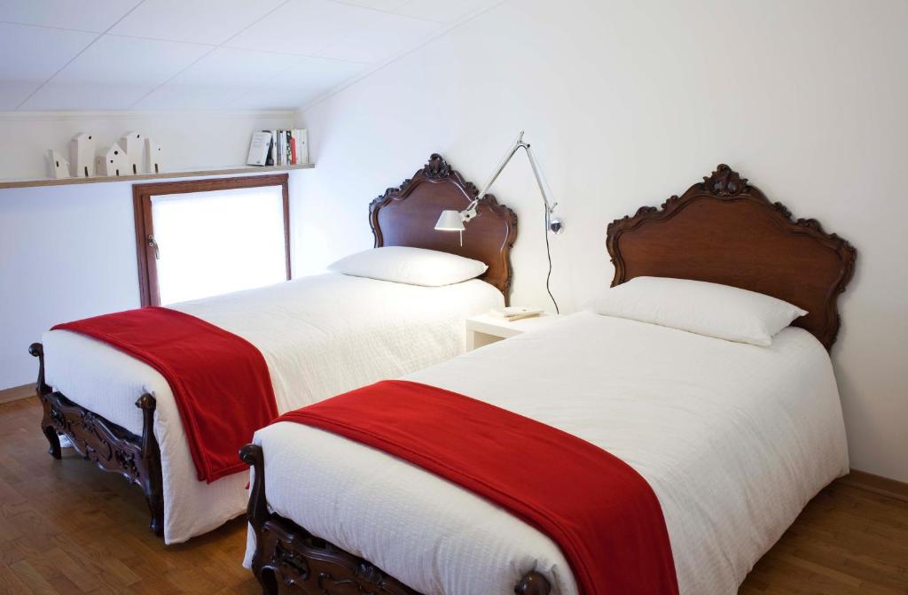Posteľ alebo postele v izbe v ubytovaní B&B ViaCavourSei