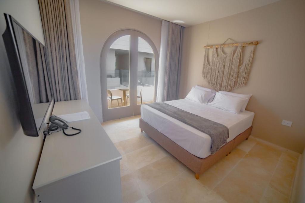 Postel nebo postele na pokoji v ubytování Loa Tolú by Bernalo Hotels