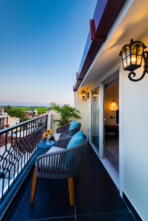 Balkón nebo terasa v ubytování Hoi An Merrily De Art Hotel