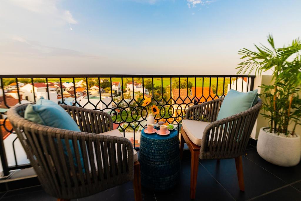 Balkón nebo terasa v ubytování Hoi An Merrily De Art Hotel