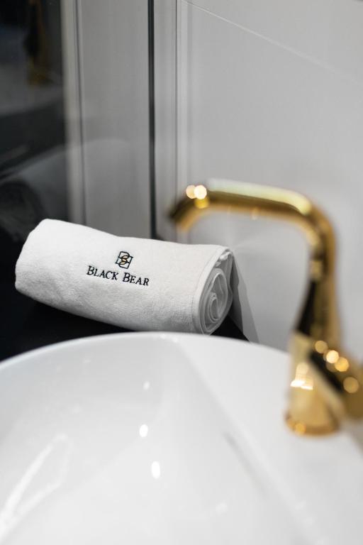 Posteľ alebo postele v izbe v ubytovaní BLACK BEAR
