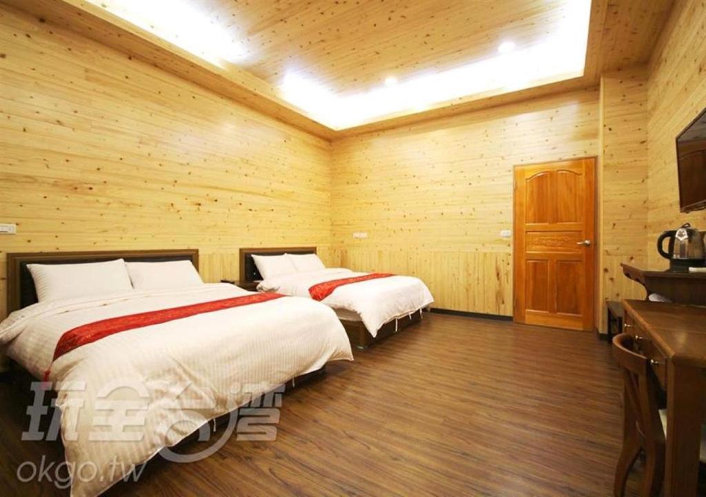 Postel nebo postele na pokoji v ubytování 大嫂的家