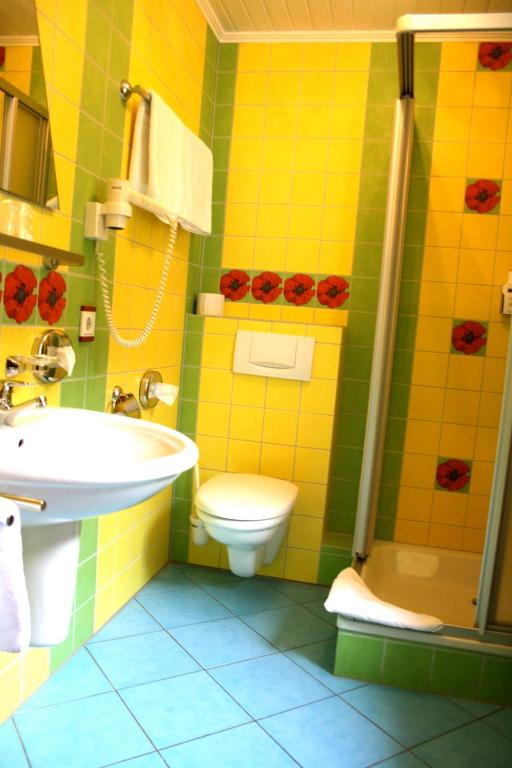 Koupelna v ubytování Hotel Garni Elegant