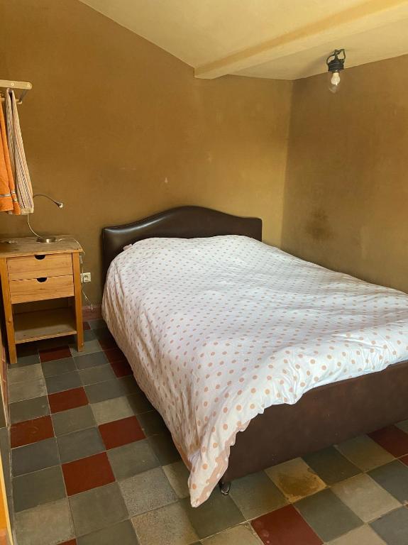 Postel nebo postele na pokoji v ubytování in Den Akker