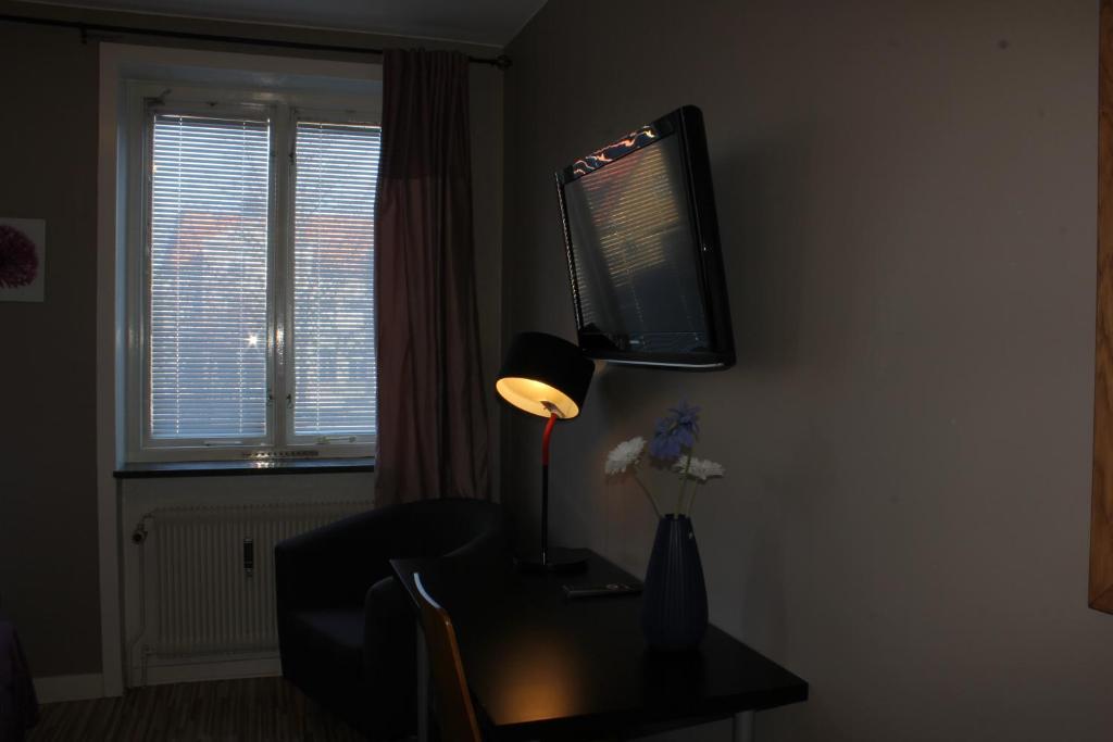 TV a/nebo společenská místnost v ubytování Hotel Tre Stockar