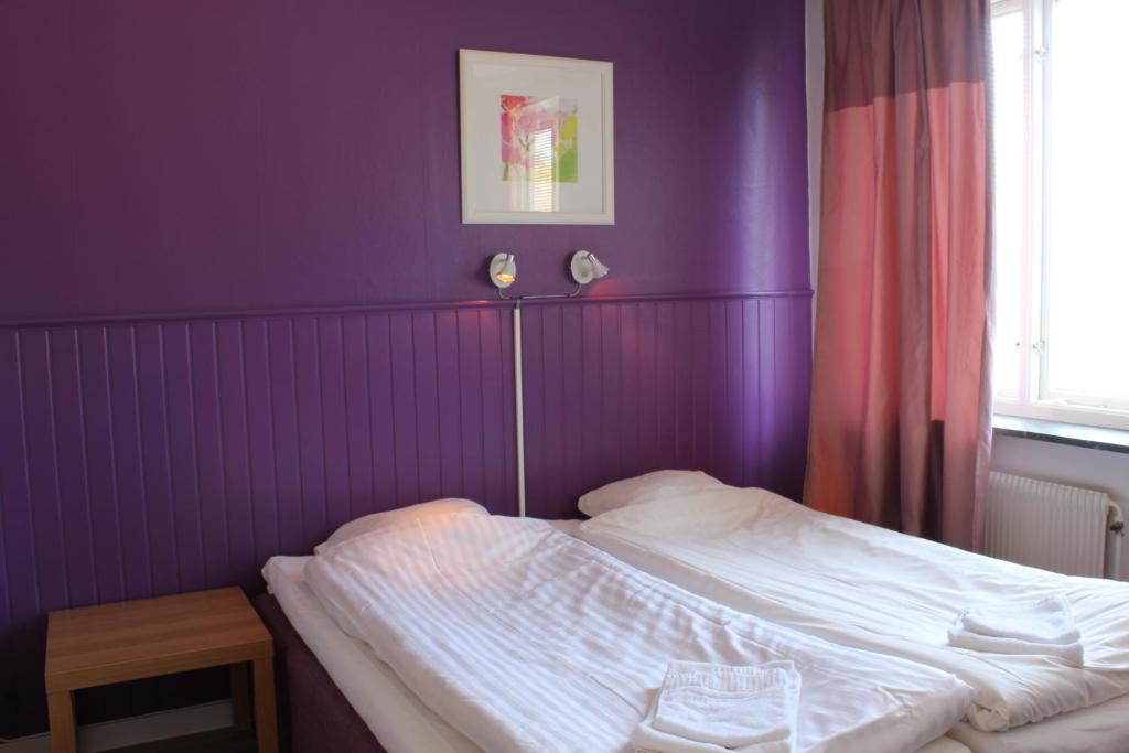 Postel nebo postele na pokoji v ubytování Hotel Tre Stockar