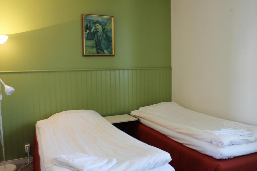 Postel nebo postele na pokoji v ubytování Hotel Tre Stockar